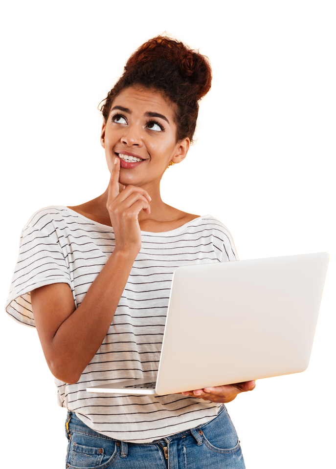 A woman looking up while using a laptop